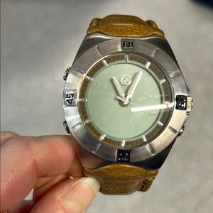 Men’s watch brown leather band. Silver green face.